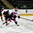 GRAND FORKS, NORTH DAKOTA - APRIL 19: USA's Clayton Keller #19 skates with the puck while Switzerland's Kaj Suter #7 chases him down during preliminary round action at the 2016 IIHF Ice Hockey U18 World Championship. (Photo by Minas Panagiotakis/HHOF-IIHF Images)

